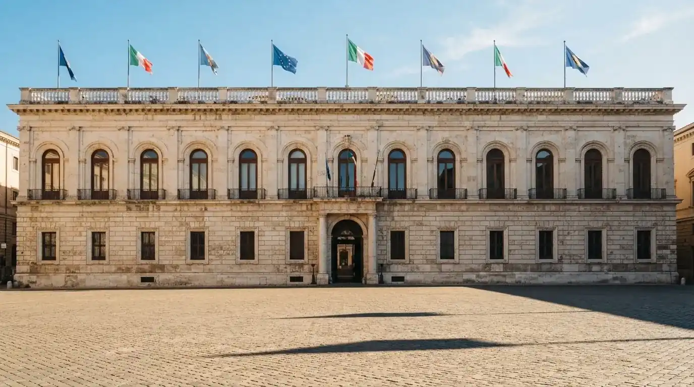 Palazzo istituzionale con bandiere al vento in una piazza soleggiata — big time gaming live casino italia
