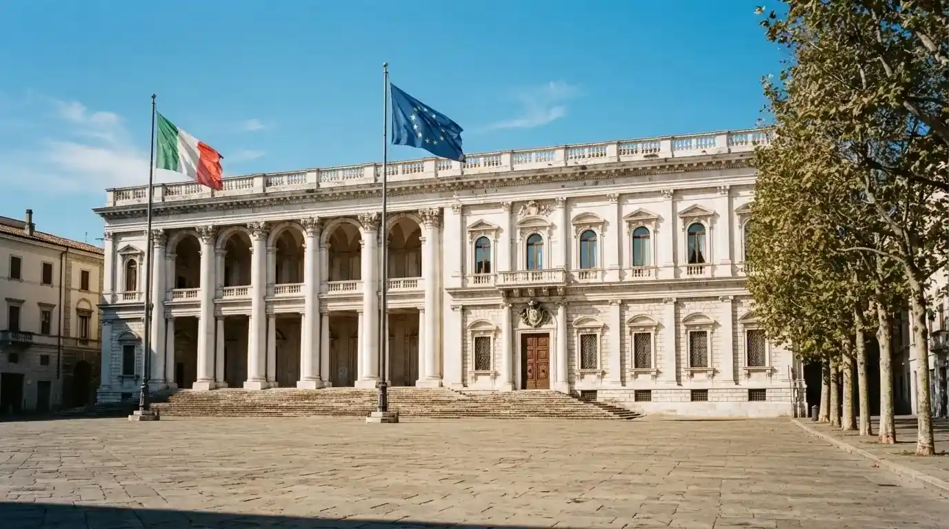 Palazzo istituzionale con bandiere al vento in una piazza soleggiata — casino com app android
